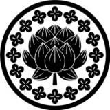 米国の新婚様からのご依頼。金木犀と蓮という変わったコラボをご所望。伝統の蓮の花をシンプルに改造し周囲を文様化した金木犀で囲んだシグネチャーリング調のデザインです